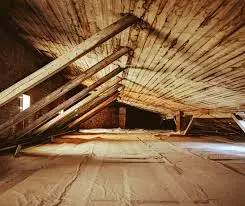 Clean crawl space after professional residential mold remediation in Charlotte, NC, showing treated wood beams.