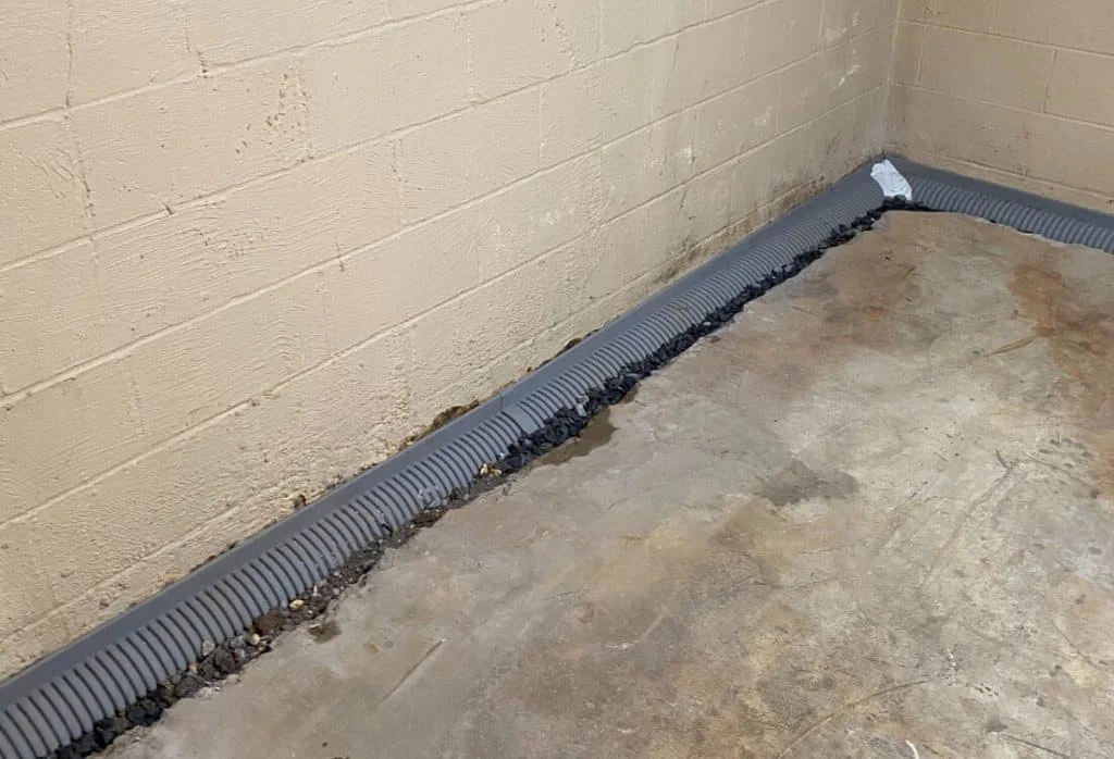 Professional water damage restoration in Gastonia, NC, featuring basement drainage and moisture control systems to prevent future mold growth.